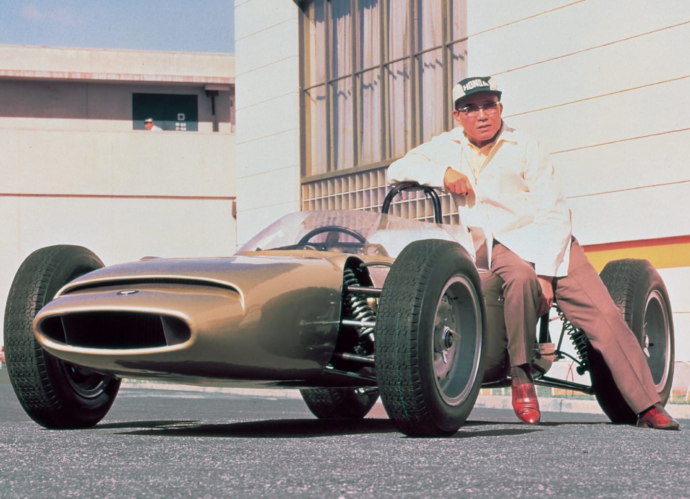 Soichiro Honda with Honda vehicle